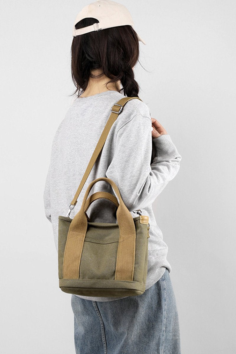 HANDLE LINE CANVAS CROSS BODY BAG