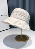 SOLID RUSHED BUCKET HAT