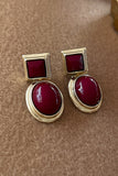 RED OVAL STUD EARRINGS