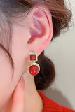 RED OVAL STUD EARRINGS